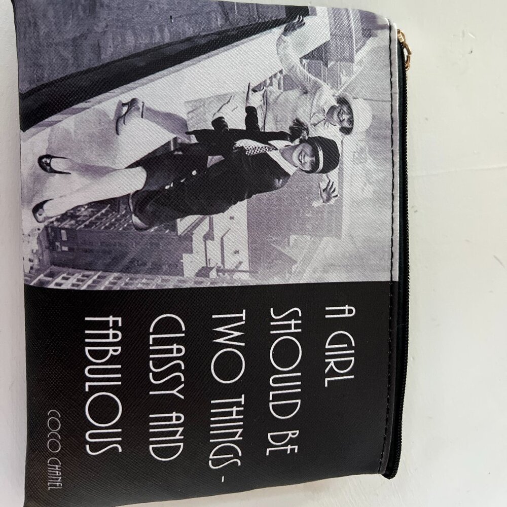 Waterproof cosmetic bag measuring 7"x5"